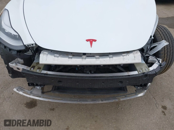 2021 Tesla Model Y Long Range with VIN 5YJYGDEE0MF209045, listed as a IAAI auction lot 41762738 with 24,721 mi miles. Bid and sale history available at carsss.com. Image 20.