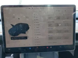2023 Tesla Model Y Long Range z VIN 7SAYGDEE7PA199067, wystawiony jako Copart lot #52463215 z przebiegiem 30 978 mil mil oraz Szkoda całkowita • Salvage title. Historia ofert i sprzedaży dostępna na DreamBid. Obrazek 9.