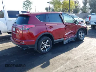 2018 Toyota RAV4 XLE with VIN JTMWFREV6JD117500, listed as a IAAI auction lot 42258588 with Not provided miles and . Bid and sale history available at DreamBid. Image 4.