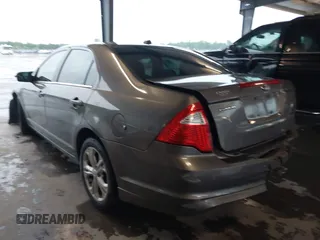 2012 Ford Fusion SE with VIN 3FAHP0HA8CR407618, listed as a IAAI auction lot 42199709 with 124,924 mi miles and . Bid and sale history available at DreamBid. Image 3.