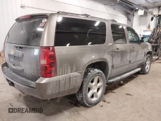 2013 Chevrolet Suburban LT with VIN 1GNSKJE76DR375916, listed as a IAAI auction lot 41588724 with 281,808 mi miles. Bid and sale history available at carsss.com. Image 4.
