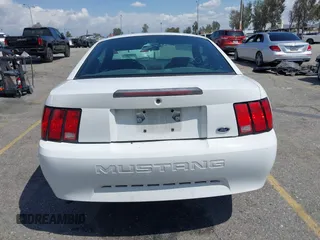 2004 Ford Mustang Standard with VIN 1FAFP40674F186503, listed as a IAAI auction lot 41915483 with 157,864 mi miles. Bid and sale history available at carsss.com. Image 16.