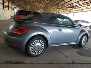 2016 Volkswagen Beetle Denim с VIN 3VW507AT8GM802601, выставлен на аукционе Copart как лот 60335415 с пробегом 71 163 миль миль и Списание • Salvage title. История ставок и продаж доступна на DreamBid. Изображение 3.