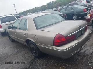 2004 Mercury Grand Marquis GS with VIN 2MEFM74W24X604421, listed as a IAAI auction lot 41929099 with 200,500 mi miles and . Bid and sale history available at DreamBid. Image 3.