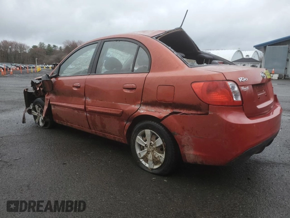 2010 Kia Rio LX with VIN KNADH4A39A6598630, listed as a Copart auction lot 51523545 with 99,896 mi miles and Non Repairable. Bid and sale history available at carsss.com. Image 2.
