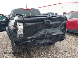 2024 Chevrolet Colorado 4WD Trail Boss with VIN 1GCPTEEK9R1310474, listed as a IAAI auction lot 42114233 with 4,970 mi miles and . Bid and sale history available at DreamBid. Image 6.