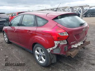 2014 Ford Focus SE with VIN 1FADP3K20EL136640, listed as a IAAI auction lot 42022467 with 137,475 mi miles. Bid and sale history available at carsss.com. Image 3.
