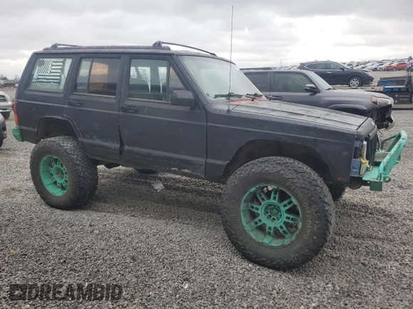 1993 Jeep Cherokee Sport with VIN 1J4FJ68S6PL506709, listed as a Copart auction lot 86638434 with 253,923 mi miles and Salvage Title. Bid and sale history available at carsss.com. Image 4.