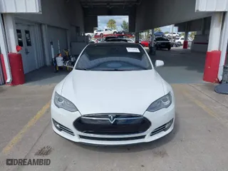 2014 Tesla Model S 60 kWh Battery with VIN 5YJSA1H16EFP51461, listed as a IAAI auction lot 40636898 with 90,762 mi miles. Bid and sale history available at carsss.com. Image 12.