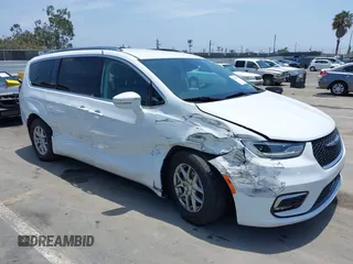 2021 Chrysler Pacifica Touring L with VIN 2C4RC1BG1MR543352, listed as a IAAI auction lot 42465274 with 94,581 mi miles and . Bid and sale history available at DreamBid. Image 1.