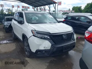 2021 Honda Passport EX-L with VIN 5FNYF8H54MB041738, listed as a IAAI auction lot 42310470 with 52,409 mi miles and . Bid and sale history available at DreamBid. Image 12.