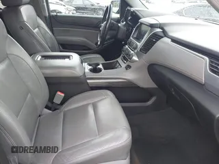 2016 Chevrolet Suburban LT z VIN 1GNSCHKCXGR111027, wystawiony jako IAAI lot #42399887 z przebiegiem 133 970 mil mil oraz . Historia ofert i sprzedaży dostępna na DreamBid. Obrazek 5.