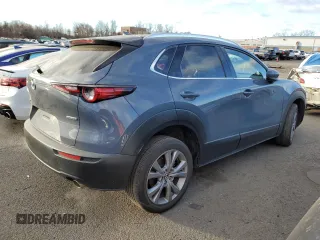 2021 Mazda CX-30 Premium with VIN 3MVDMBDM2MM220739, listed as a Copart auction lot 86848764 with 48,522 mi miles and Salvage title. Bid and sale history available at DreamBid. Image 3.