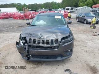 2019 Jeep Cherokee Latitude Plus with VIN 1C4PJLLBXKD305219, listed as a IAAI auction lot 42150283 with 89,000 mi miles and . Bid and sale history available at DreamBid. Image 12.
