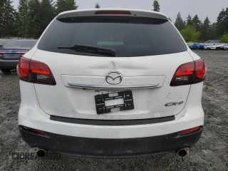 2014 Mazda CX-9 Grand Touring with VIN JM3TB2DA5E0438288, listed as a Copart auction lot 56970705 with 147,526 mi miles and Salvage title. Bid and sale history available at DreamBid. Image 6.