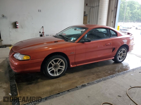 1997 Ford Mustang GT with VIN 1FALP42X3VF130827, listed as a Copart auction lot 60529995 with 112,799 mi miles and Salvage title. Bid and sale history available at DreamBid. Image 1.
