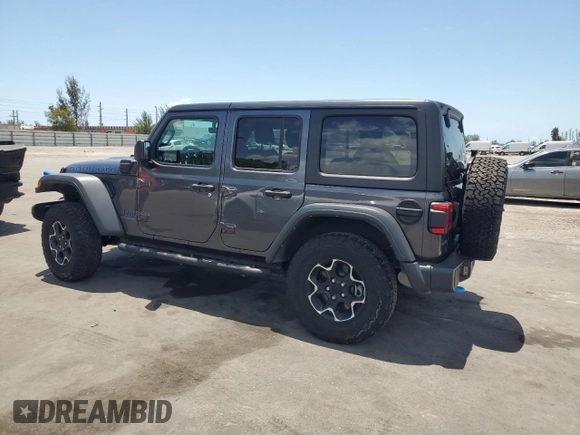 2023 Jeep Wrangler Rubicon z VIN 1C4JJXR65PW557849, wystawiony jako Copart lot #57845705 z przebiegiem 21 849 mil mil oraz Szkoda całkowita • Salvage title. Historia ofert i sprzedaży dostępna na DreamBid. Obrazek 2.