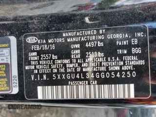 2016 Kia Optima EX with VIN 5XXGU4L34GG054250, listed as a Copart auction lot 55881065 with 100,785 mi miles and Clean Title. Bid and sale history available at carsss.com. Image 12.