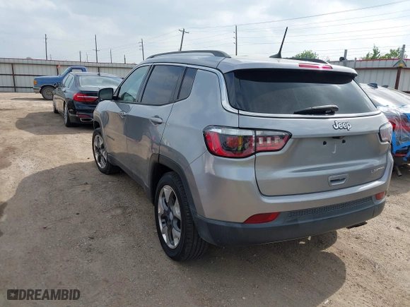 2019 Jeep Compass Limited with VIN 3C4NJCCB9KT793631, listed as a IAAI auction lot 41933473 with 124,216 mi miles. Bid and sale history available at carsss.com. Image 3.