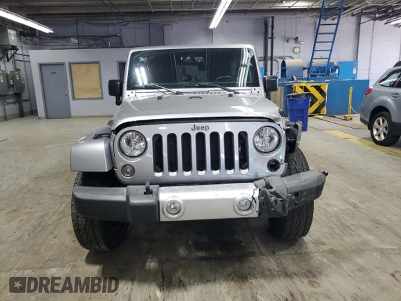 2015 Jeep Wrangler Unlimited Sahara with VIN 1C4BJWEG5FL743663, listed as a Copart auction lot 60205225 with 69,922 mi miles and Salvage title. Bid and sale history available at DreamBid. Image 5.