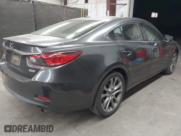 2015 Mazda 6 i Grand Touring with VIN JM1GJ1W58F1199550, listed as a IAAI auction lot 42064381 with 145,465 mi miles and . Bid and sale history available at carsss.com. Image 4.