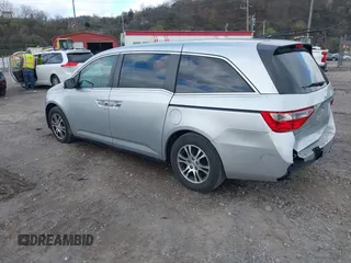 2011 Honda Odyssey EX-L with VIN 5FNRL5H60BB012206, listed as a IAAI auction lot 41982987 with 220,913 mi miles and . Bid and sale history available at carsss.com. Image 3.