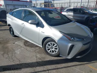2019 Toyota Prius L Eco with VIN JTDKARFU3K3082893, listed as a IAAI auction lot 41370727 with 217,582 mi miles. Bid and sale history available at carsss.com. Image 1.