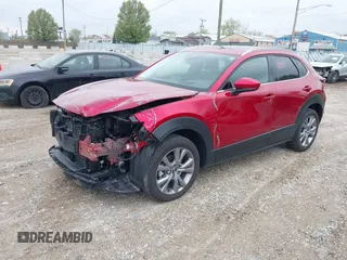 2023 Mazda CX-30 S Premium with VIN 3MVDMBDM3PM511402, listed as a IAAI auction lot 42180001 with 6,189 mi miles and . Bid and sale history available at DreamBid. Image 23.