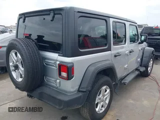 2023 Jeep Wrangler Sport with VIN 1C4HJXDG2PW508235, listed as a IAAI auction lot 42127823 with 25,069 mi miles and . Bid and sale history available at DreamBid. Image 4.
