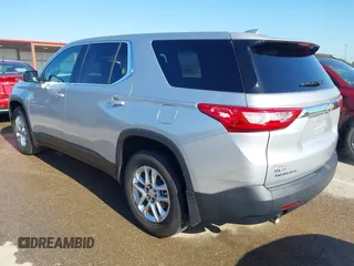 2018 Chevrolet Traverse LS z VIN 1GNERFKW7JJ145166, wystawiony jako IAAI lot #42161304 z przebiegiem 104 165 mil mil oraz . Historia ofert i sprzedaży dostępna na DreamBid. Obrazek 3.