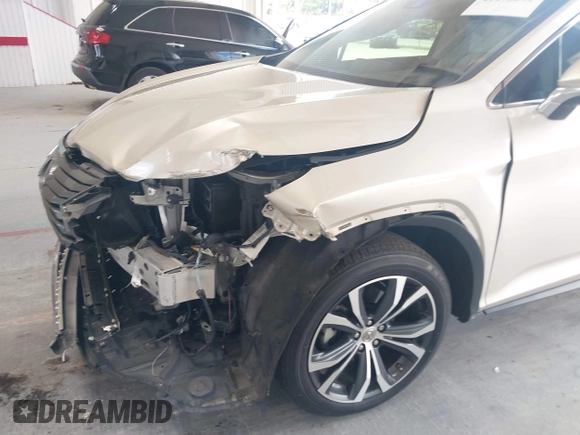 2016 Lexus RX 350 z VIN 2T2ZZMCA7GC026812, wystawiony jako IAAI lot #42470092 z przebiegiem 49 426 mil mil oraz . Historia ofert i sprzedaży dostępna na DreamBid. Obrazek 6.