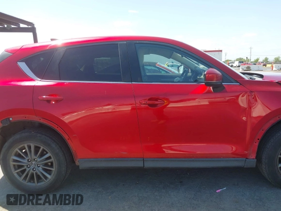 2019 Mazda CX-5 Touring with VIN JM3KFACM5K1516242, listed as a IAAI auction lot 42019803 with 113,953 mi miles. Bid and sale history available at carsss.com. Image 13.