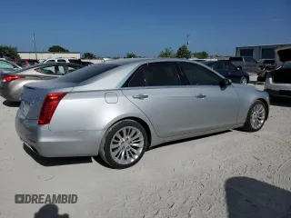 2016 Cadillac CTS Luxury Collection AWD with VIN 1G6AX5SX7G0103193, listed as a Copart auction lot 61808174 with 104,129 mi miles and Clean Title. Bid and sale history available at DreamBid. Image 3.