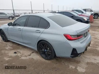 2023 BMW 3 Series 330e with VIN 3MW39FF00P8D57706, listed as a IAAI auction lot 41560259 with 1 mi miles. Bid and sale history available at carsss.com. Image 3.