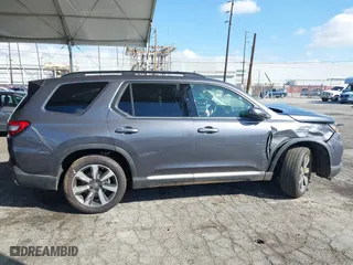 2025 Honda Pilot Touring with VIN 5FNYG2H73SB004351, listed as a IAAI auction lot 41699830 with 6,377 mi miles. Bid and sale history available at carsss.com. Image 13.