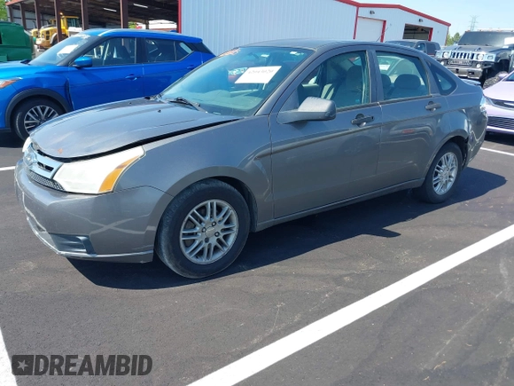 2009 Ford Focus SE with VIN 1FAHP35N19W246382, listed as a IAAI auction lot 42043020 with 197,707 mi miles. Bid and sale history available at carsss.com. Image 2.