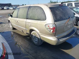 2001 Dodge Caravan Sport with VIN 2B8GP44G21R129935, listed as a IAAI auction lot 42009037 with Not Provided miles and . Bid and sale history available at carsss.com. Image 3.