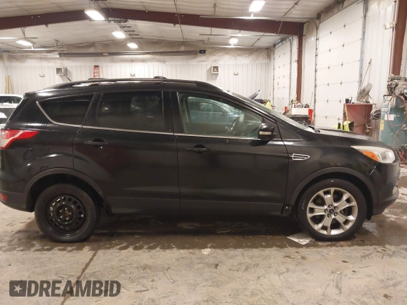 2013 Ford Escape SEL with VIN 1FMCU9H96DUC64584, listed as a IAAI auction lot 41357053 with 139,422 mi miles. Bid and sale history available at carsss.com. Image 13.