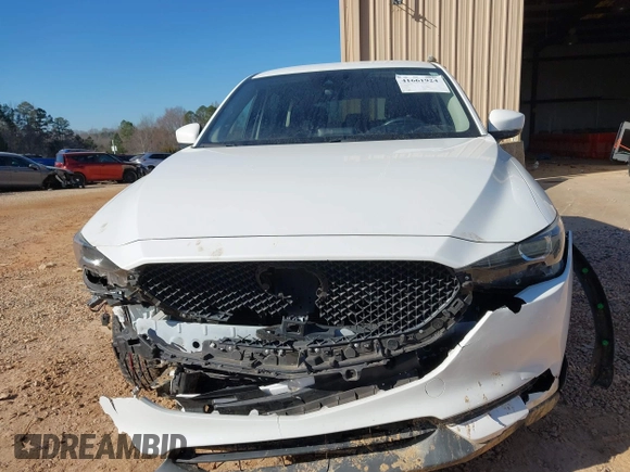 2019 Mazda CX-5 Sport with VIN JM3KFBBM0K0574255, listed as a IAAI auction lot 41661924 with 93,851 mi miles and . Bid and sale history available at DreamBid. Image 12.