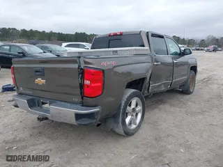 2015 Chevrolet Silverado 1500 LTZ with VIN 3GCUKSEC5FG467252, listed as a IAAI auction lot 41544477 with 144,719 mi miles. Bid and sale history available at carsss.com. Image 4.
