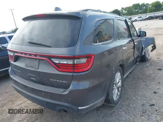 2014 Dodge Durango Citadel with VIN 1C4RDHEG2EC381324, listed as a IAAI auction lot 42021611 with 104,178 mi miles and . Bid and sale history available at DreamBid. Image 4.