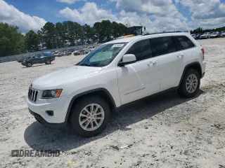2016 Jeep Grand Cherokee Laredo with VIN 1C4RJEAG1GC455025, listed as a Copart auction lot 60784985 with 164,901 mi miles and Salvage title. Bid and sale history available at DreamBid. Image 1.