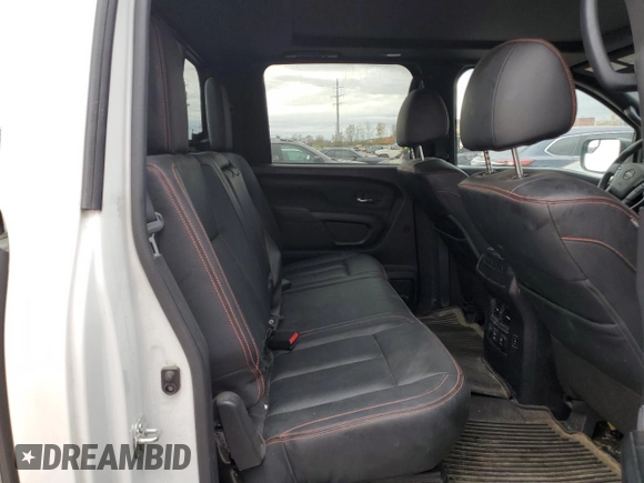 2023 Nissan Titan SV z VIN 1N6AA1ED7PN116504, wystawiony jako Copart lot #77986734 z przebiegiem 31 392 mil mil oraz Szkoda całkowita • Salvage title. Historia ofert i sprzedaży dostępna na DreamBid. Obrazek 10.