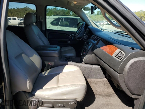 2011 GMC Yukon SLE with VIN 1GKS1AE02BR213992, listed as a Copart auction lot 75609704 with 133,536 mi miles and Salvage Title. Bid and sale history available at carsss.com. Image 7.