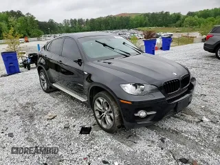 2011 BMW X6 50i z VIN 5UXFG8C50BLZ96931, wystawiony jako Copart lot #54409465 z przebiegiem 154 818 mil mil oraz Szkoda całkowita • Salvage title. Historia ofert i sprzedaży dostępna na DreamBid. Obrazek 14.