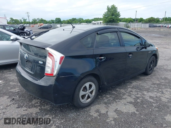 2012 Toyota Prius One with VIN JTDKN3DUXC1610785, listed as a IAAI auction lot 42651718 with 212,689 mi miles and . Bid and sale history available at DreamBid. Image 4.