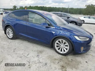 2016 Tesla Model X 70D z VIN 5YJXCBE27GF007972, wystawiony jako Copart lot #53945325 z przebiegiem 83 395 mil mil oraz Szkody całkowita. Historia ofert i sprzedaży dostępna na DreamBid. Obrazek 4.