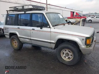 1989 Isuzu Trooper z VIN JACCH58R2K8925551, wystawiony jako IAAI lot #41302440 z przebiegiem 225 913 mil mil oraz . Historia ofert i sprzedaży dostępna na DreamBid. Obrazek 1.
