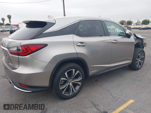 2021 Lexus RX 450h with VIN 2T2HGMDA3MC060208, listed as a IAAI auction lot 42163455 with 34,167 mi miles and . Bid and sale history available at DreamBid. Image 4.