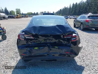 2022 Tesla Model 3 Long Range with VIN 5YJ3E1EB7NF241996, listed as a IAAI auction lot 42115915 with 23,433 mi miles and . Bid and sale history available at DreamBid. Image 6.